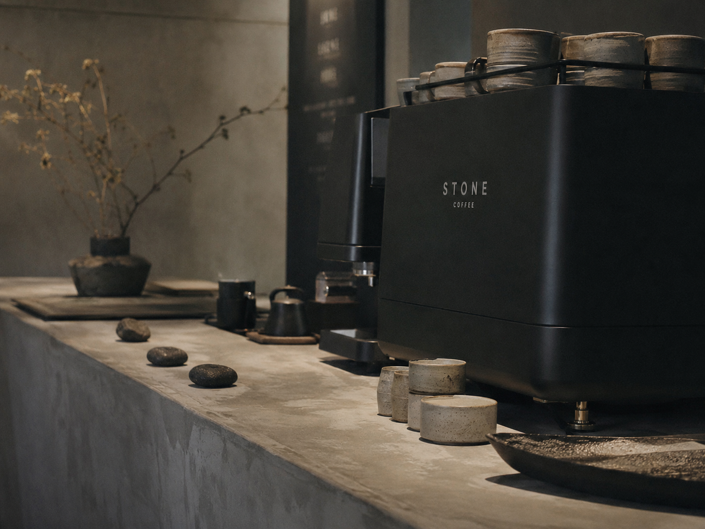 Stone Coffee bar counter in raw concrete and matte black